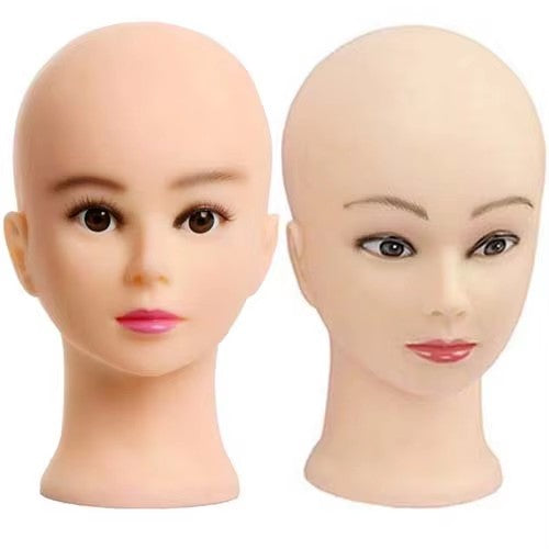 A female bald mannequin head is displayed as a dummy head
