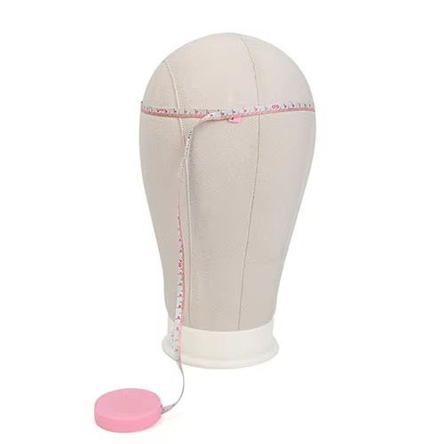 Canvas-shaped head displaying the head of a sculpted doll model